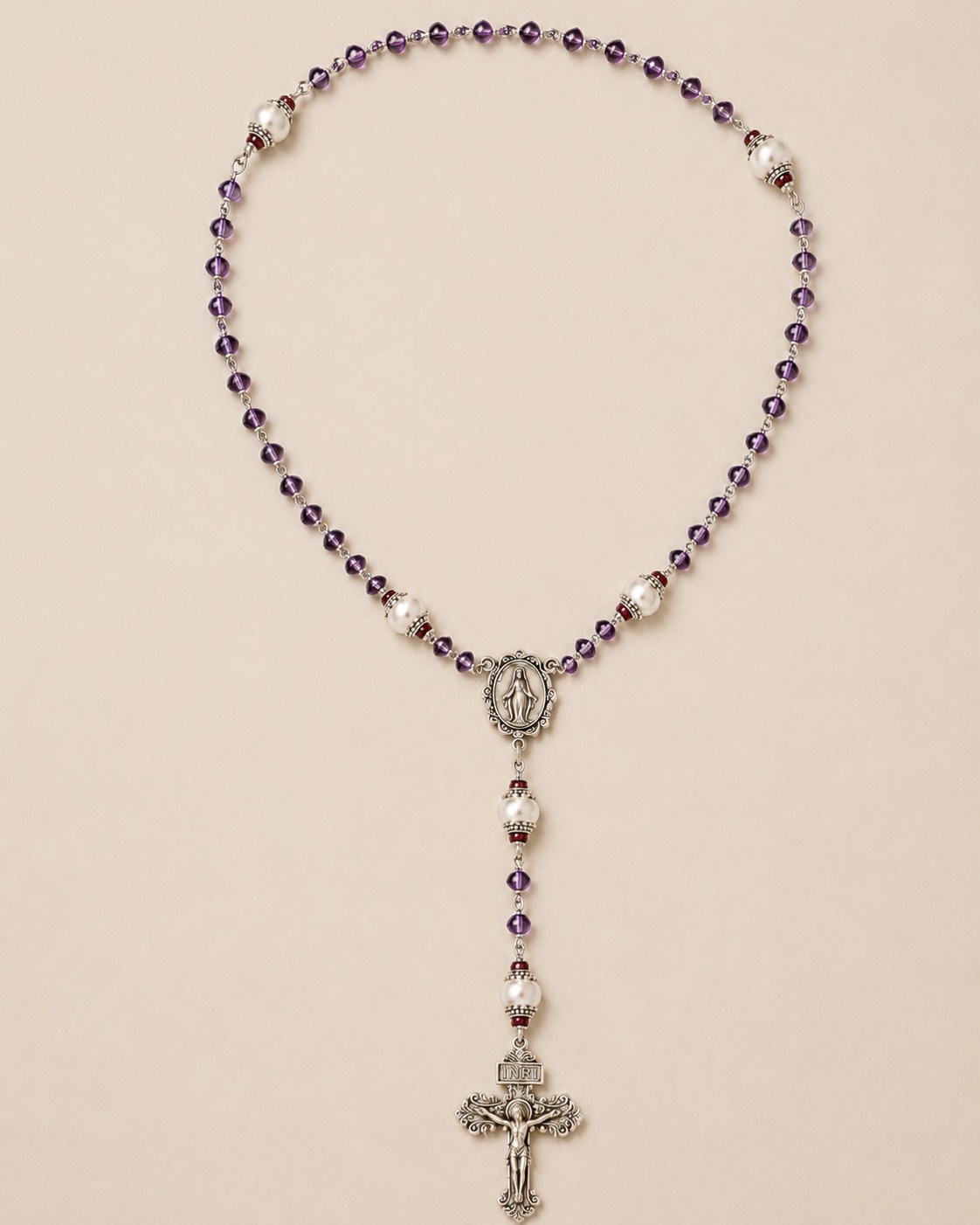Burgundy Pearl-Accent Rosary on a warm parchment background